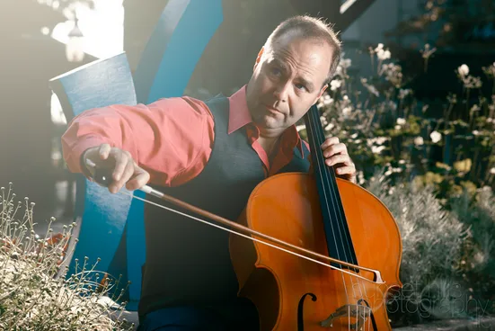 Dr. Roman Placzek playing cello