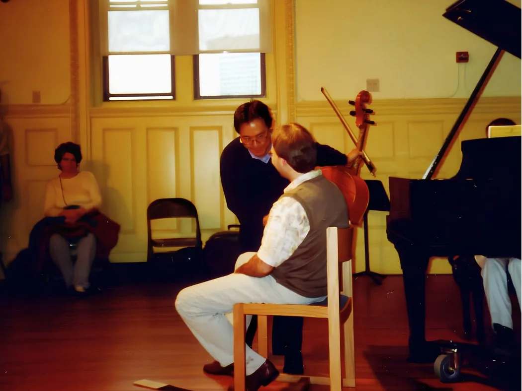 Ro-Ro Ma adn Yo-Yo Ma. Dr. Roman Placzek during a masterclass with Yo-Yo Ma from the time of his studies at The Boston Conservatory.